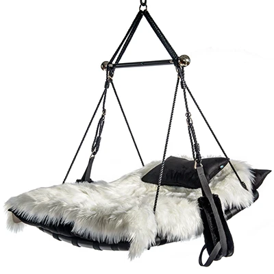 Swing with fur cover and black upholstery